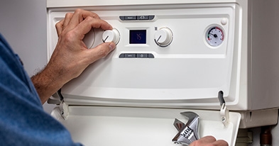 person repairing electric water heater